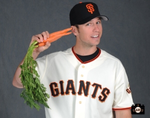 Buster Posey poses for the Jr Giants handbook on Tuesday, February 19, 2013.